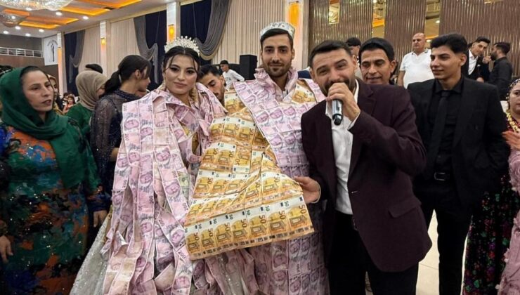 Düğünde gelin ve damada paradan yelek giydirip, taç taktılar