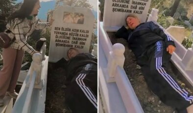 Eşinin mezarında toprağın üstüne yatarak hüngür hüngür ağladı