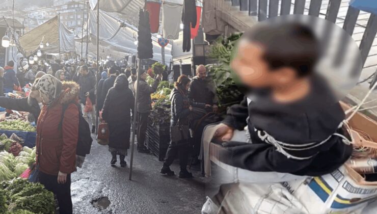 Pazarda eşofman çalan çocuğu iple bağladı