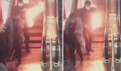Yürüyen merdivenden alev saçarak indi