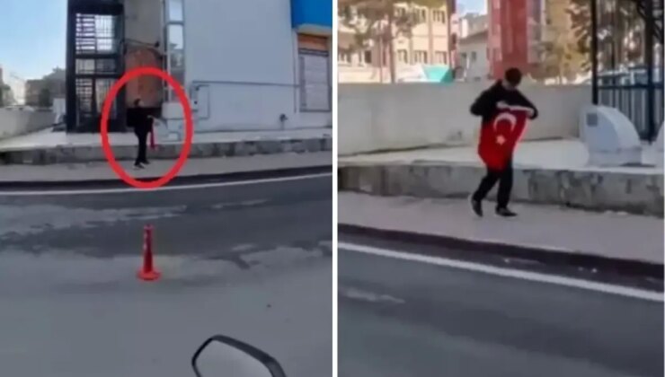 14 yaşındaki çocuk yerde gördüğü Türk bayrağını öperek kaldırdı