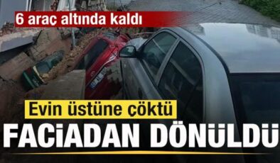 Faciadan dönüldü! İstinat duvarı evin üstüne çöktü! 6 araç altında kaldı